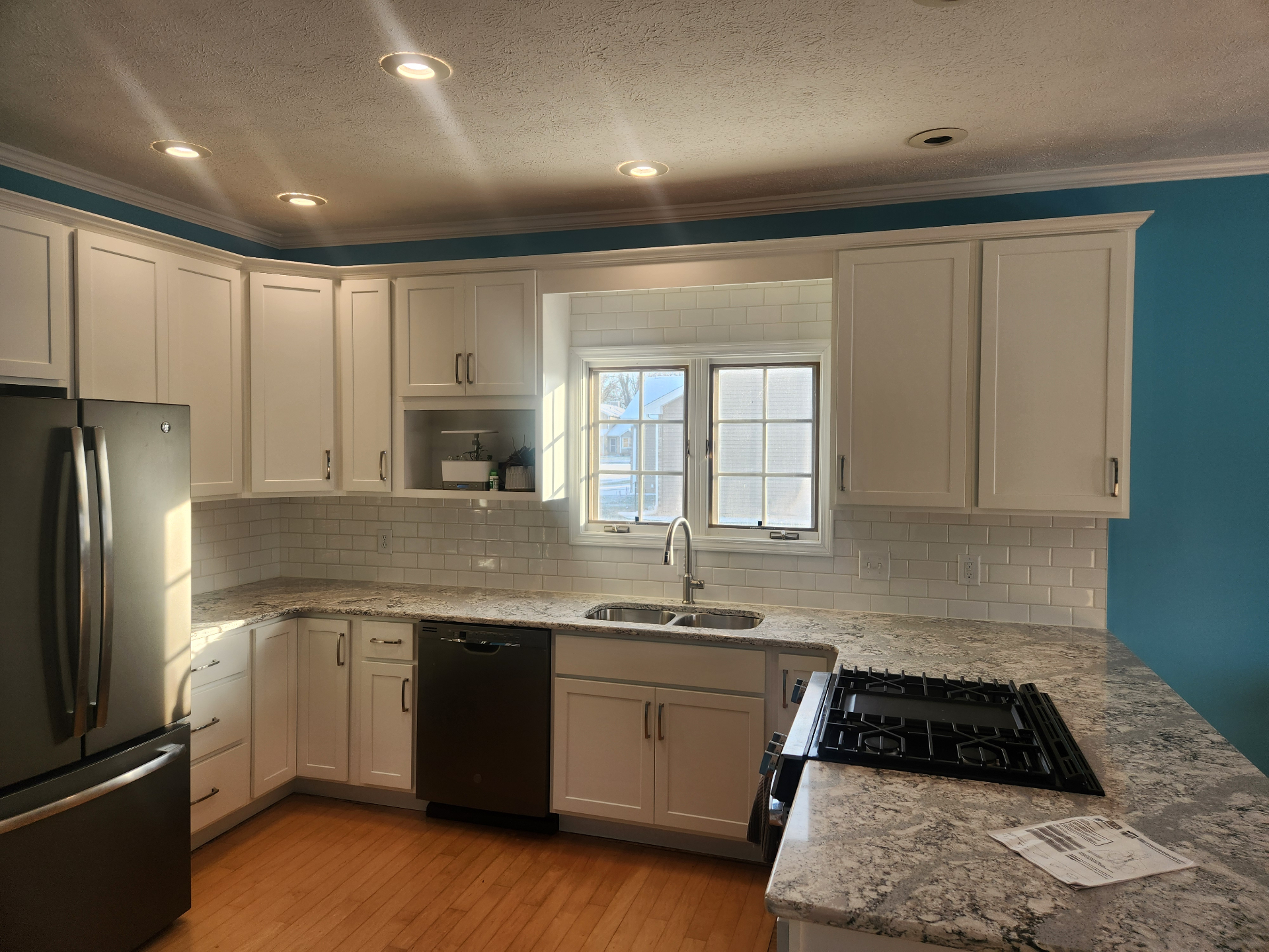 Bright white shaker on teal — Oldenkamp Family